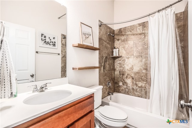 full bathroom with shower / bath combo with shower curtain, vanity, and toilet