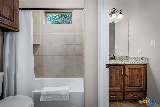 full bath with vanity, toilet, and shower / tub combo with curtain