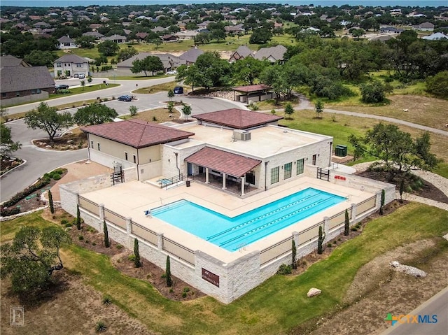 view of pool with a fenced in pool, a patio area, and fence