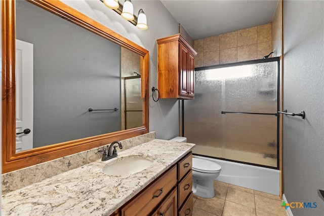 2299 Sun Chase Blvd, New Braunfels, TX 78130 - bathroom with vanity, enclosed tub / shower combo, and tile patterned flooring