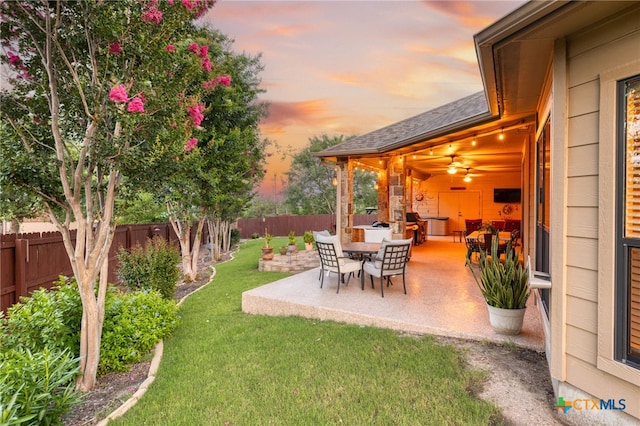 2299 Sun Chase Blvd, New Braunfels, TX 78130 - fenced backyard with a patio area