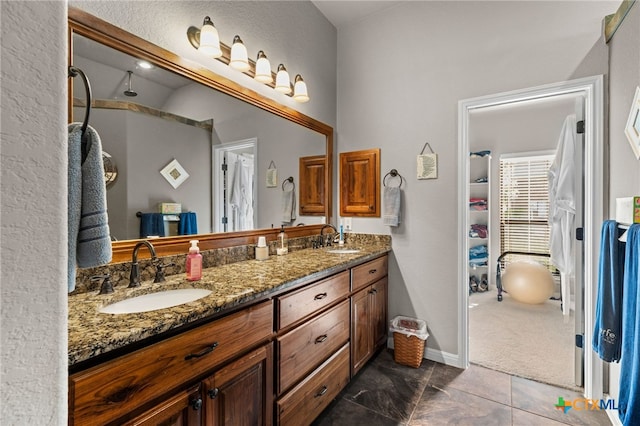2299 Sun Chase Blvd, New Braunfels, TX 78130 - bathroom featuring double vanity and tile patterned floors