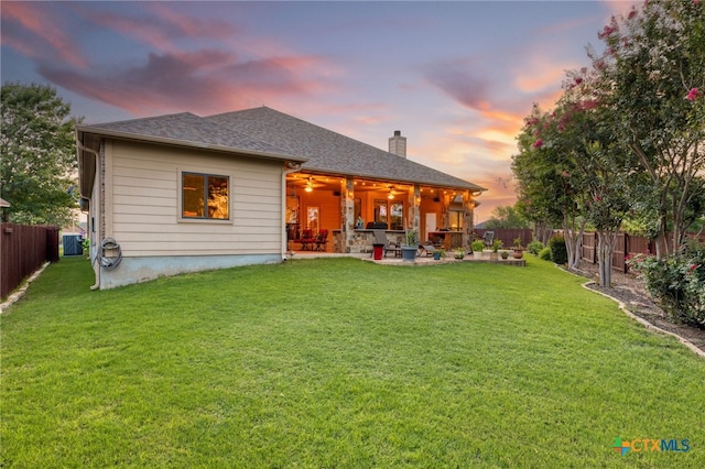 2299 Sun Chase Blvd, New Braunfels, TX 78130 - rear view of house featuring a patio, a fenced backyard, a chimney, and a ceiling fan