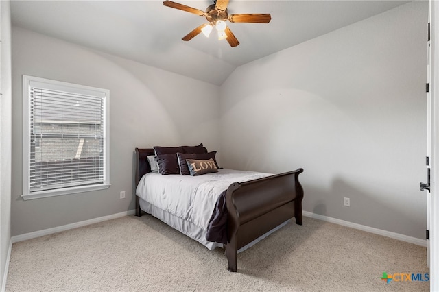 2299 Sun Chase Blvd, New Braunfels, TX 78130 - bedroom featuring light colored carpet, vaulted ceiling, and ceiling fan