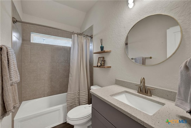 6010 Ballast Trl, New Braunfels, TX 78132 - bathroom with vanity, toilet, shower / tub combo, vaulted ceiling, and a textured wall