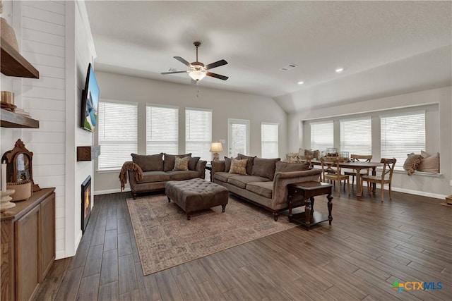 6010 Ballast Trl, New Braunfels, TX 78132 - living area with baseboards, ceiling fan, healthy amount of natural light, and lofted ceiling