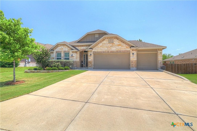 6010 Ballast Trl, New Braunfels, TX 78132 - french country home featuring concrete driveway, a garage, and stone siding