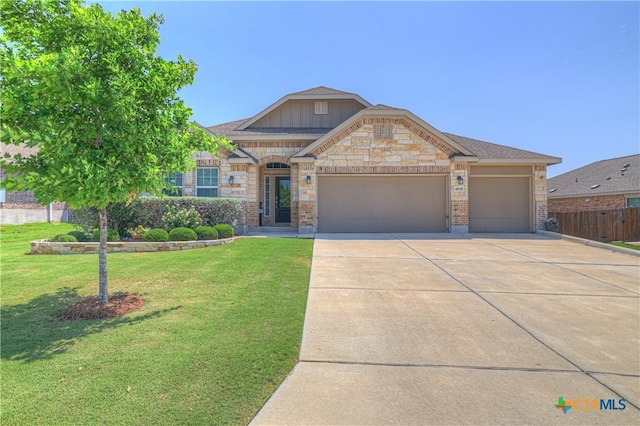 6010 Ballast Trl, New Braunfels, TX 78132 - view of front of property featuring driveway, a garage, and stone siding