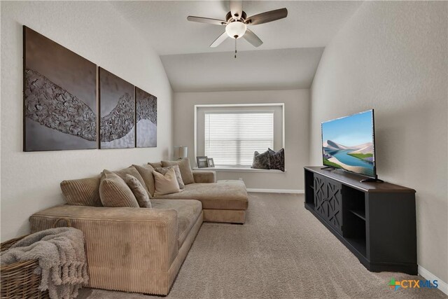 6010 Ballast Trl, New Braunfels, TX 78132 - carpeted living room with lofted ceiling, a ceiling fan, and baseboards