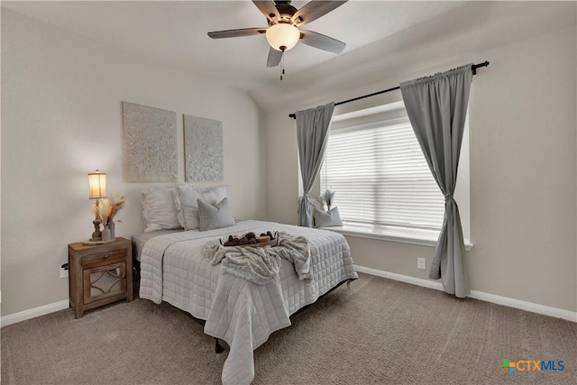 6010 Ballast Trl, New Braunfels, TX 78132 - carpeted bedroom featuring baseboards, lofted ceiling, and ceiling fan