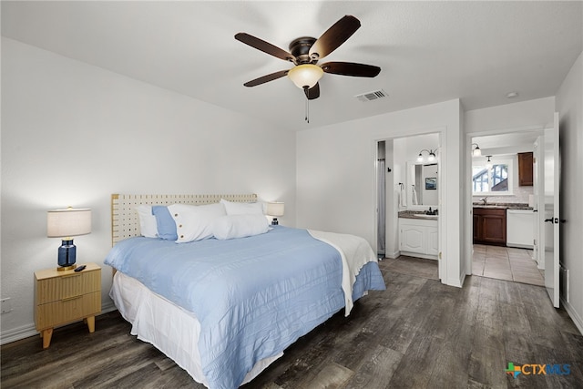 bedroom featuring ceiling fan, connected bathroom, dark hardwood / wood-style flooring, and sink