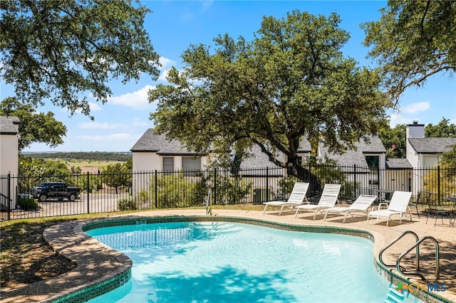 view of pool with a patio