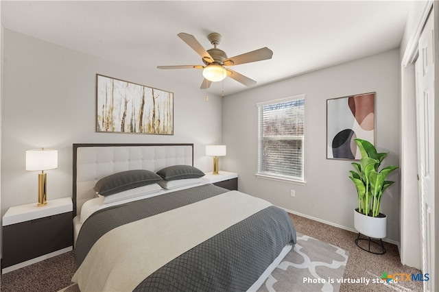 carpeted bedroom with ceiling fan