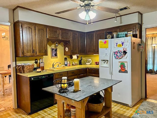 kitchen featuring dishwasher, white fridge with ice dispenser, sink, and a textured ceiling