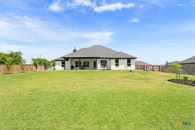 100 Metheglin Dr, Temple, TX 76502 - back of property featuring a fenced backyard and roof with shingles