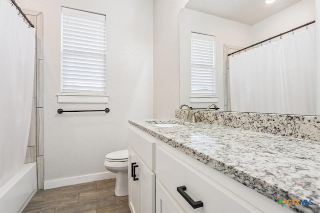 100 Metheglin Dr, Temple, TX 76502 - full bath featuring vanity, wood finished floors, and shower / tub combo with curtain