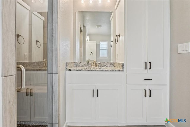 100 Metheglin Dr, Temple, TX 76502 - bathroom with a stall shower and vanity