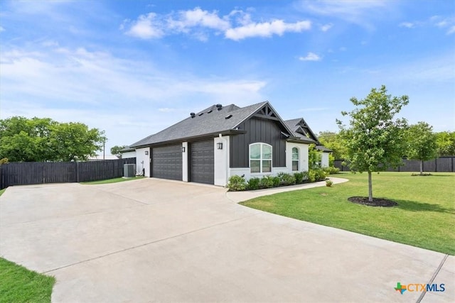 100 Metheglin Dr, Temple, TX 76502 - view of front of house with driveway, board and batten siding, and an attached garage
