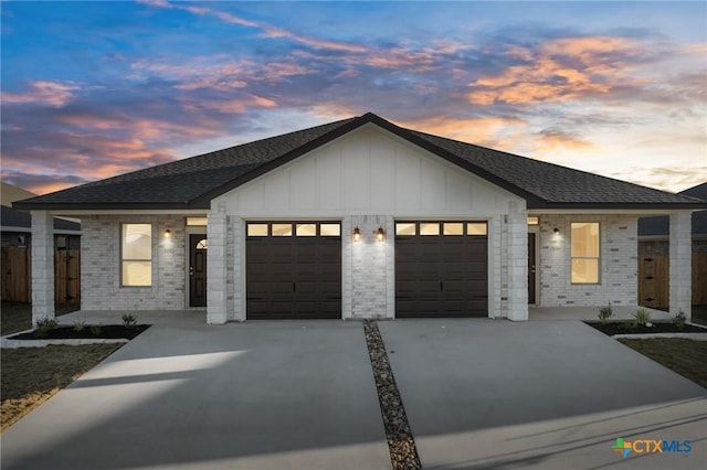 view of front of home with a garage