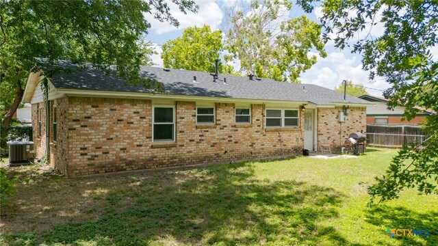 603 S 13th St, Copperas Cove, TX 76522 - rear view of property with brick siding and a shingled roof