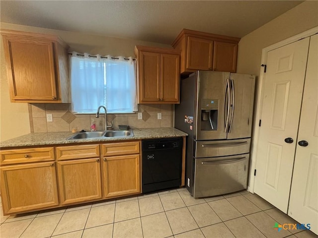 kitchen with dishwasher, sink, stainless steel fridge with ice dispenser, decorative backsplash, and light tile patterned flooring