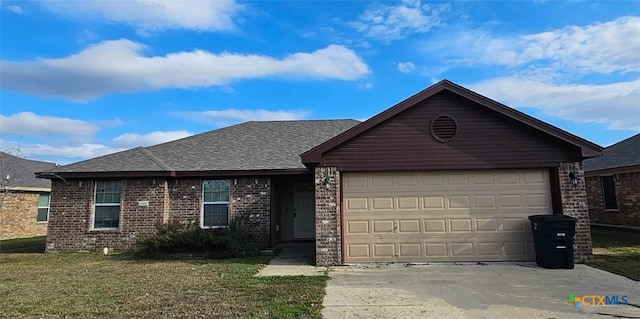 ranch-style house featuring roof with shingles, brick siding, a front yard, a garage, and driveway