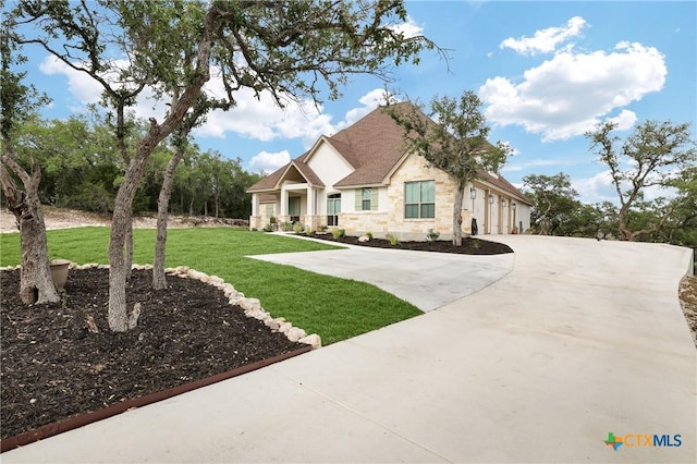 craftsman-style house with a front lawn