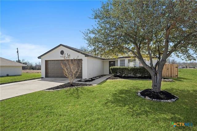 view of front of house featuring a garage, concrete driveway, a front yard, and fence