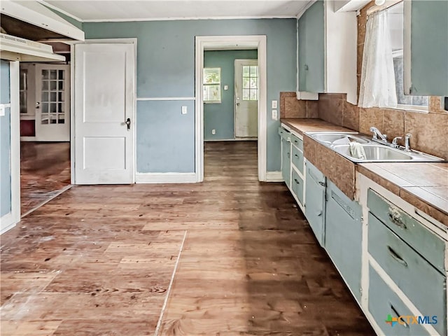 1805 E N St, Victoria, TX 77901 - kitchen with tile counters and wood finished floors