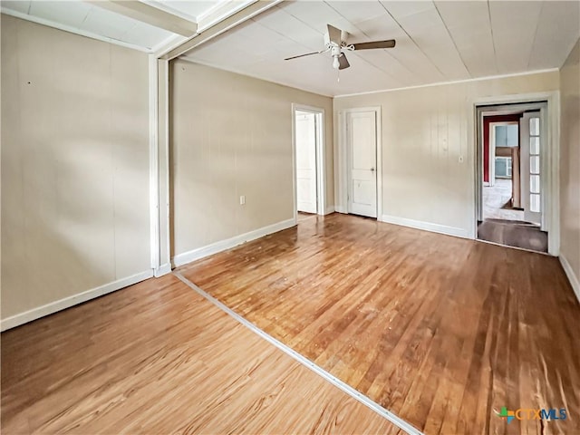 1805 E N St, Victoria, TX 77901 - unfurnished bedroom featuring wood finished floors and ceiling fan