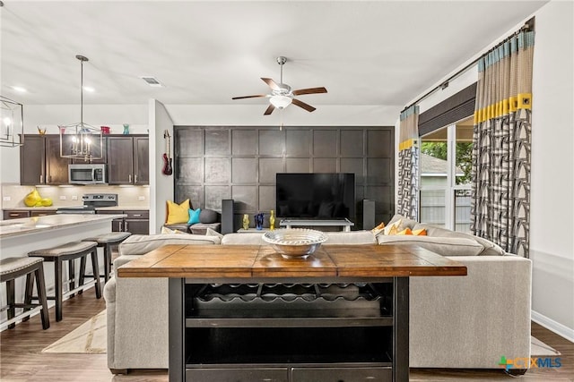 7907 Montclair Dr, Temple, TX 76502 - living room with wood finished floors and ceiling fan