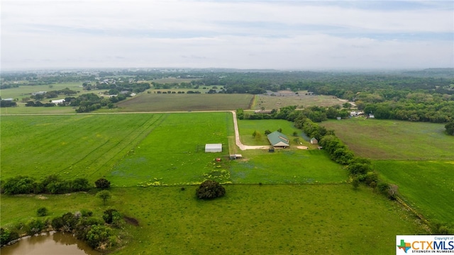 aerial view featuring a water view and a rural view