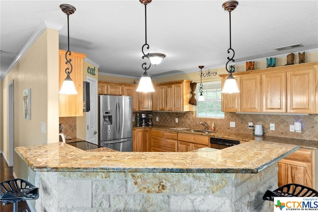 kitchen with kitchen peninsula, appliances with stainless steel finishes, backsplash, and hanging light fixtures