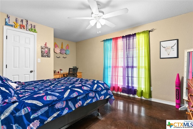 bedroom with a textured ceiling and ceiling fan