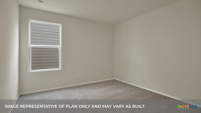 carpeted empty room with baseboards