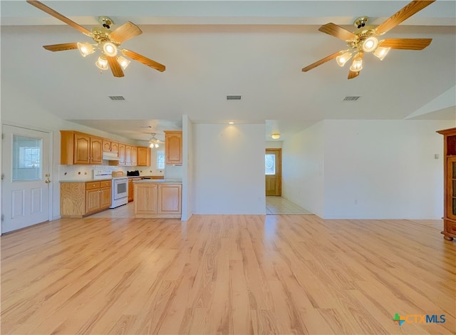 unfurnished living room with ceiling fan and light hardwood / wood-style flooring