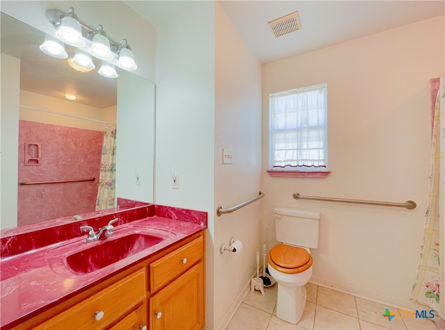 bathroom featuring vanity, curtained shower, tile patterned floors, and toilet