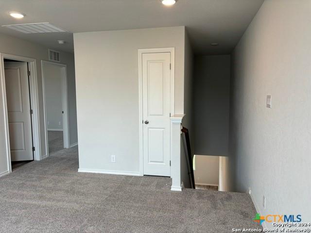 2537 Windle Ln, Seguin, TX 78155 - unfurnished bedroom featuring carpet floors and baseboards