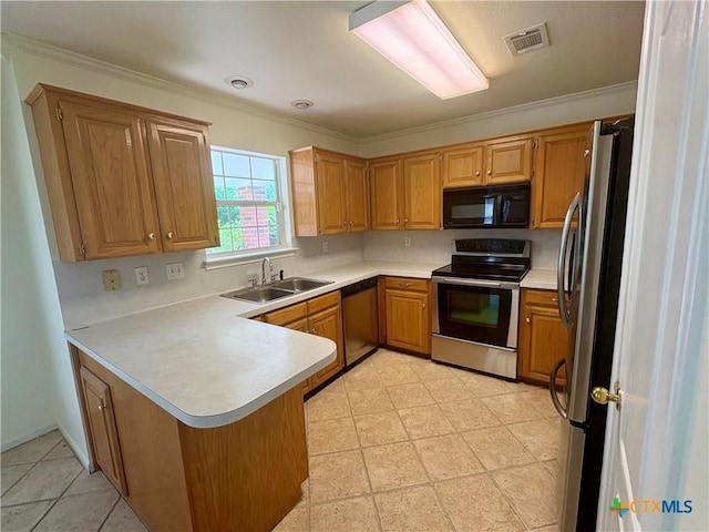 1807 Rally Ln, Harker Heights, TX 76548 - kitchen featuring stainless steel appliances, a peninsula, a sink, light countertops, and crown molding