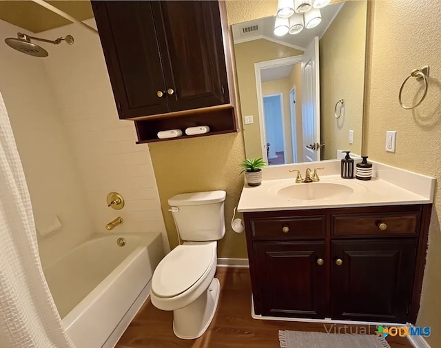 1807 Rally Ln, Harker Heights, TX 76548 - full bathroom featuring wood finished floors, ornamental molding, vanity, toilet, and shower / bathtub combination with curtain