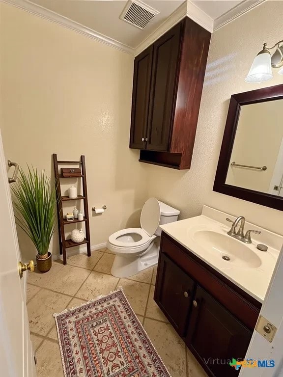 1807 Rally Ln, Harker Heights, TX 76548 - half bath featuring vanity, toilet, ornamental molding, and baseboards