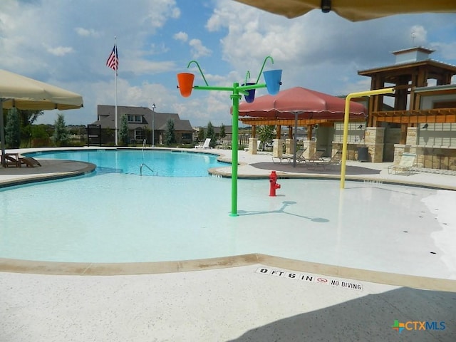 pool featuring a patio