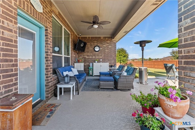 view of patio / terrace with an outdoor hangout area and ceiling fan