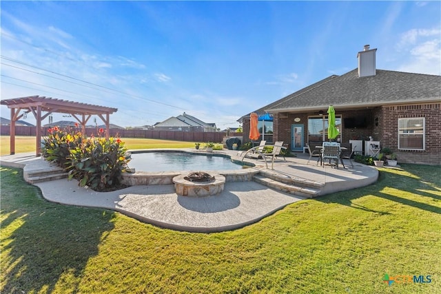 view of pool with a patio area, a pergola, a yard, and an outdoor fire pit