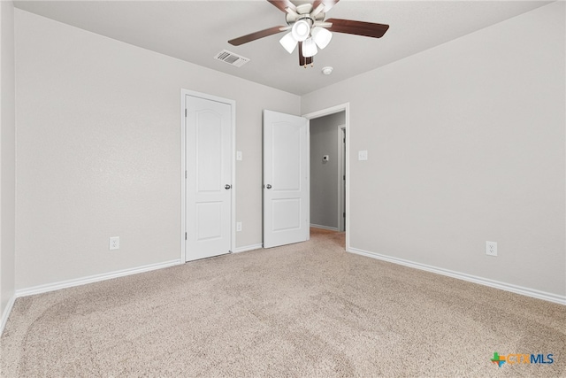 unfurnished bedroom featuring carpet flooring and ceiling fan