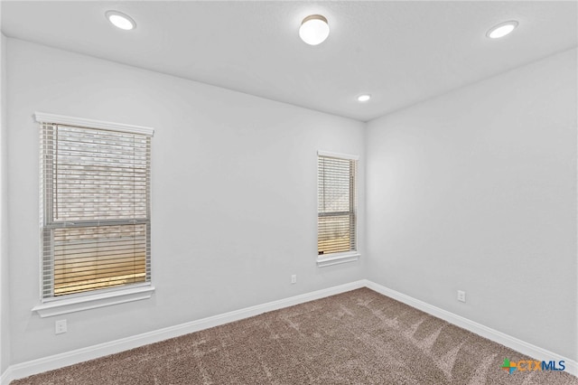 empty room with carpet floors