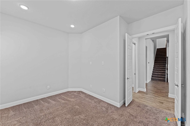 unfurnished room with carpet flooring