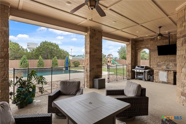 view of patio with a fenced in pool, a fenced backyard, ceiling fan, and grilling area