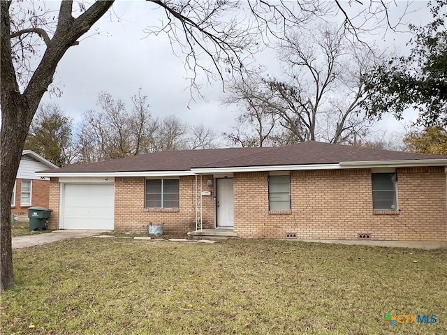 single story home with a front yard and a garage