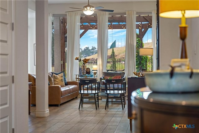 1235 Yaupon Loop, New Braunfels, TX 78132 - dining space with ceiling fan and plenty of natural light